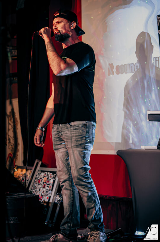Man Singing on Stage