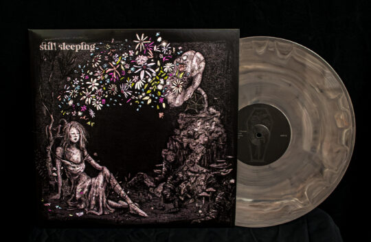 Still Sleeping Vinyl Cover, Girl sitting while record player shoots out flowers